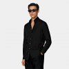 Black Large Classic Collar Slim Fit Shirt: On its own or paired with a jacket, this adaptable black shirt is tailored slim with large point collar, ultra-fine stitching, a neat french placket, and a subtly curved hemline that's perfect for wearing untucke