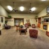BeeHive Homes of Lamesa Assisted Living - Vaulted ceilings and rustic furnishings make the living room a desirable place to visit